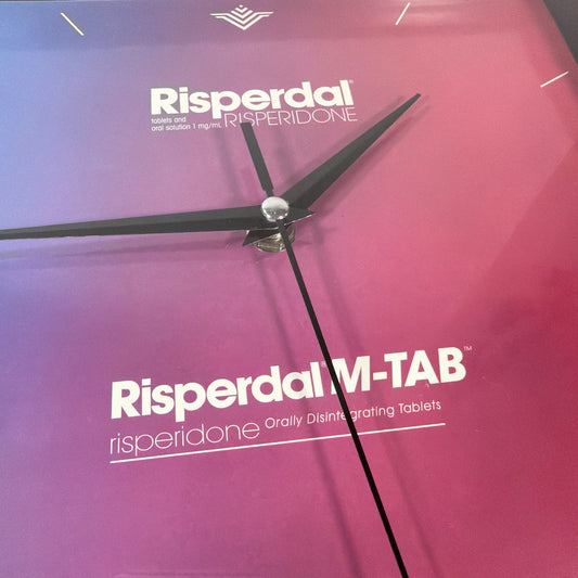 Risperdal M-TAB Drug Rep Promotional Wall Clock 10.5 x 11 Tested Working