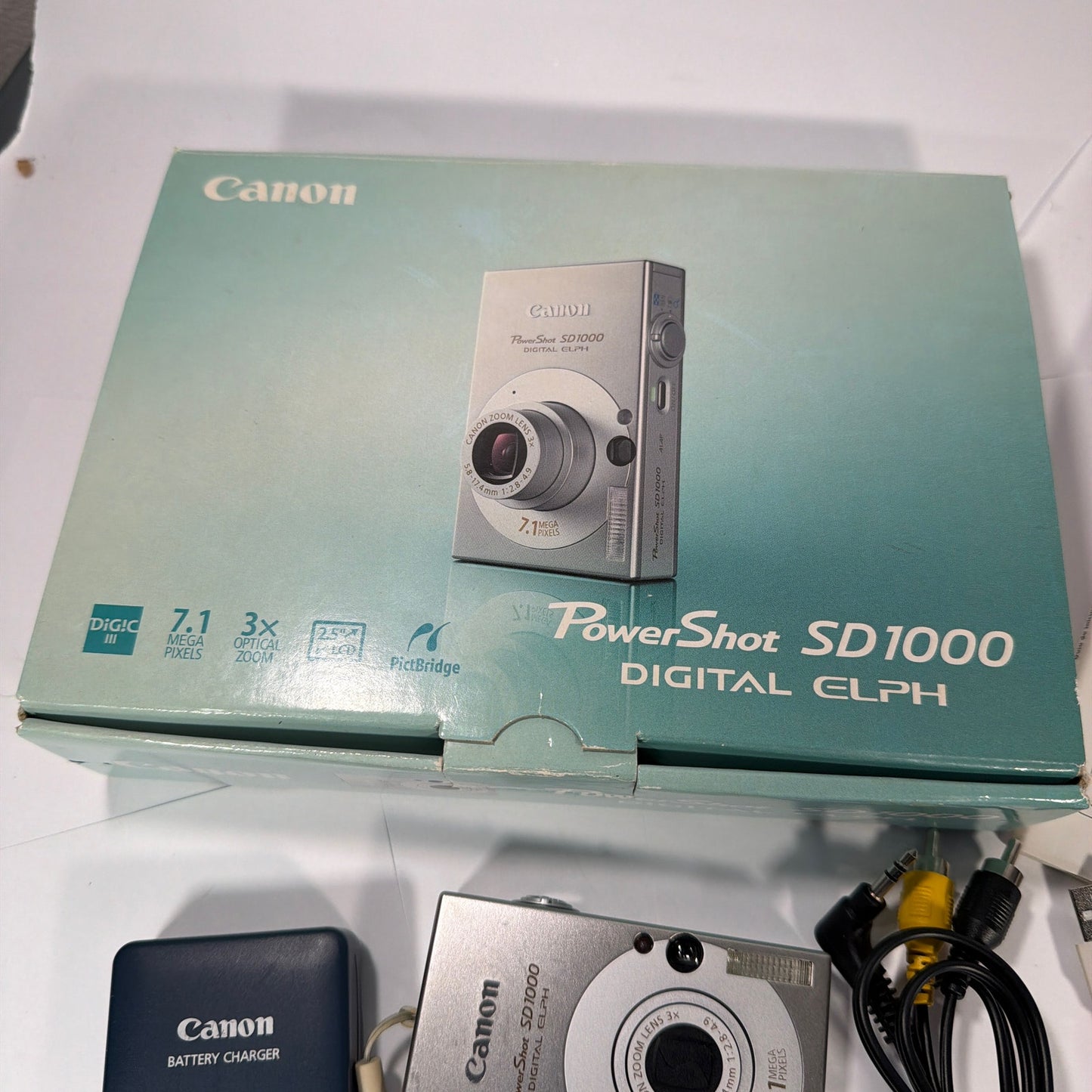 Canon PowerShot SD1000 Digital ELPH 7.1MP Silver Camera Tested Working